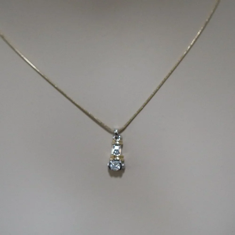 LADIES VINTAGE 14 KARAT WHITE & YELLOW GOLD BEZEL SET DIAMOND PENDANT